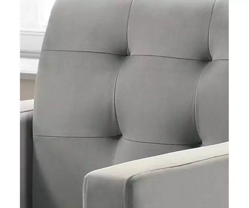 Fauteuil d'appoint en velours capitonné